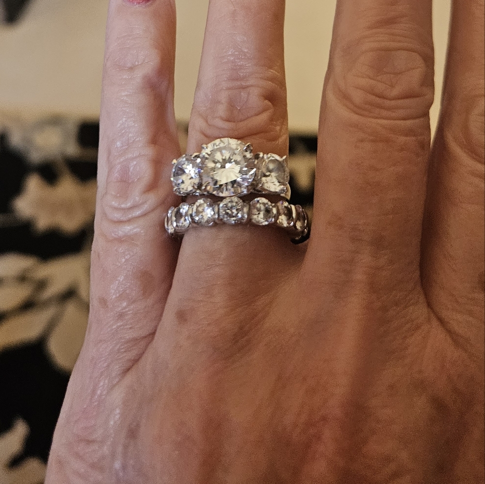 Fantasia wedding band and engagement ring. 925 silver about 8 or 9 carats CZ